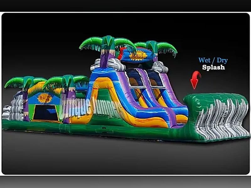 40-foot inflatable tropical obstacle course set up on an open property near Greenwood, TX